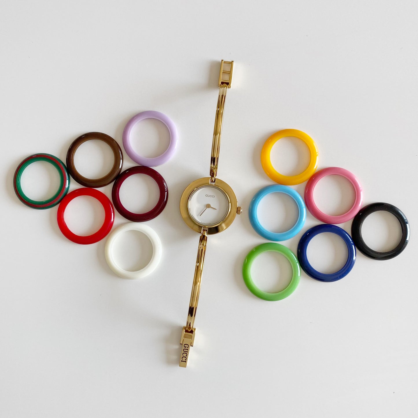 Gucci 1990s Interchangeable Bezel Gold Plated Bangle Watch with 12 bezels, case (Small)