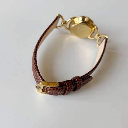 Gucci 1990s Round Cream Dial Horsebit Gold Plated Watch
