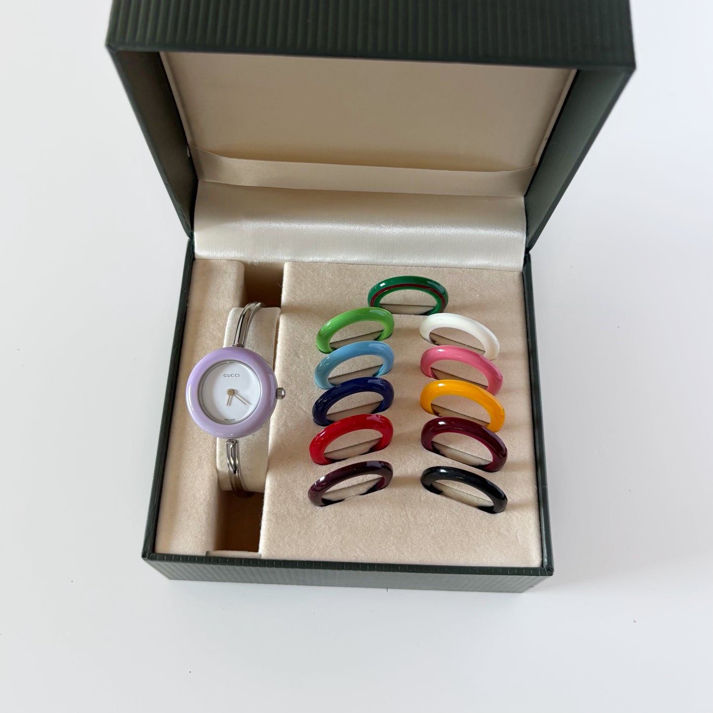 Gucci 1990s Interchangeable Bezel Stainless Steel Bangle Watch with 12 bezels, case