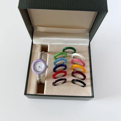 Gucci 1990s Interchangeable Bezel Stainless Steel Bangle Watch with 12 bezels, case