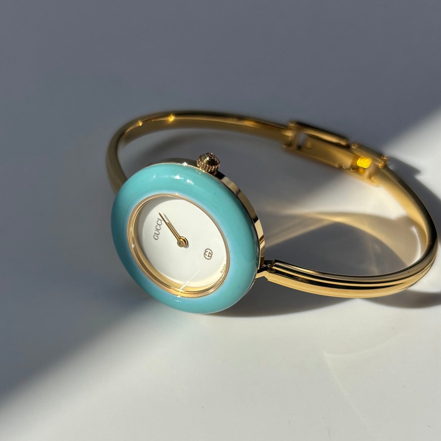 Gucci 1990s Interchangeable Bezel Gold Plated Bangle Watch with 12 bezels, case
