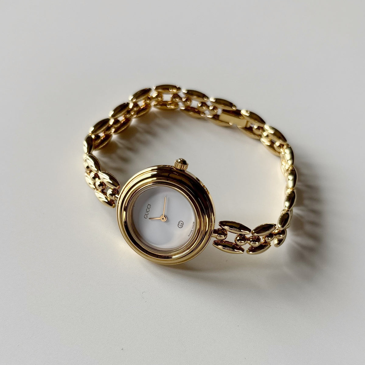 Gucci 1990s Interchangeable Bezel Gold Plated Rice Chain Watch with 6 bezels, case (165mm)