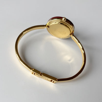 Gucci 1990s Interchangeable Bezel Gold Plated Bangle Watch with 12 bezels, case