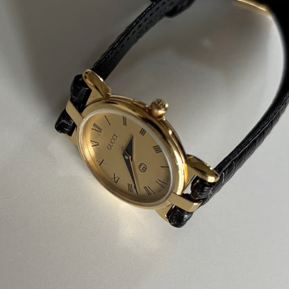 Gucci 1990s Round Dial Gold Plated Watch