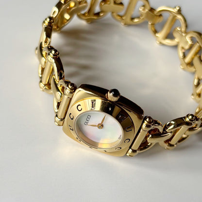Gucci 1990s Seashell Dial Horsebit Gold Plated Watch