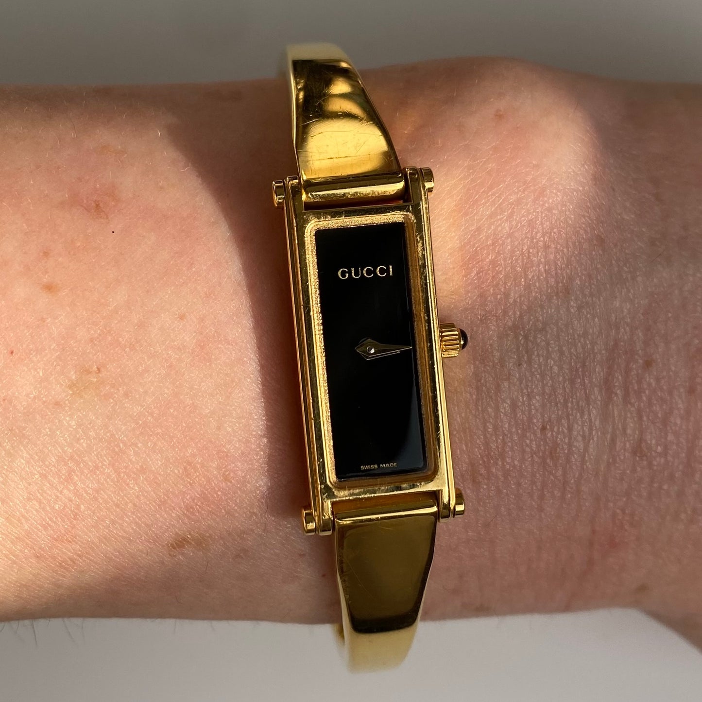 Gucci 1990s Black Dial Gold Plated Rectangular Bangle Watch