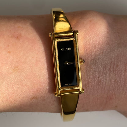 Gucci 1990s Black Dial Gold Plated Rectangular Bangle Watch