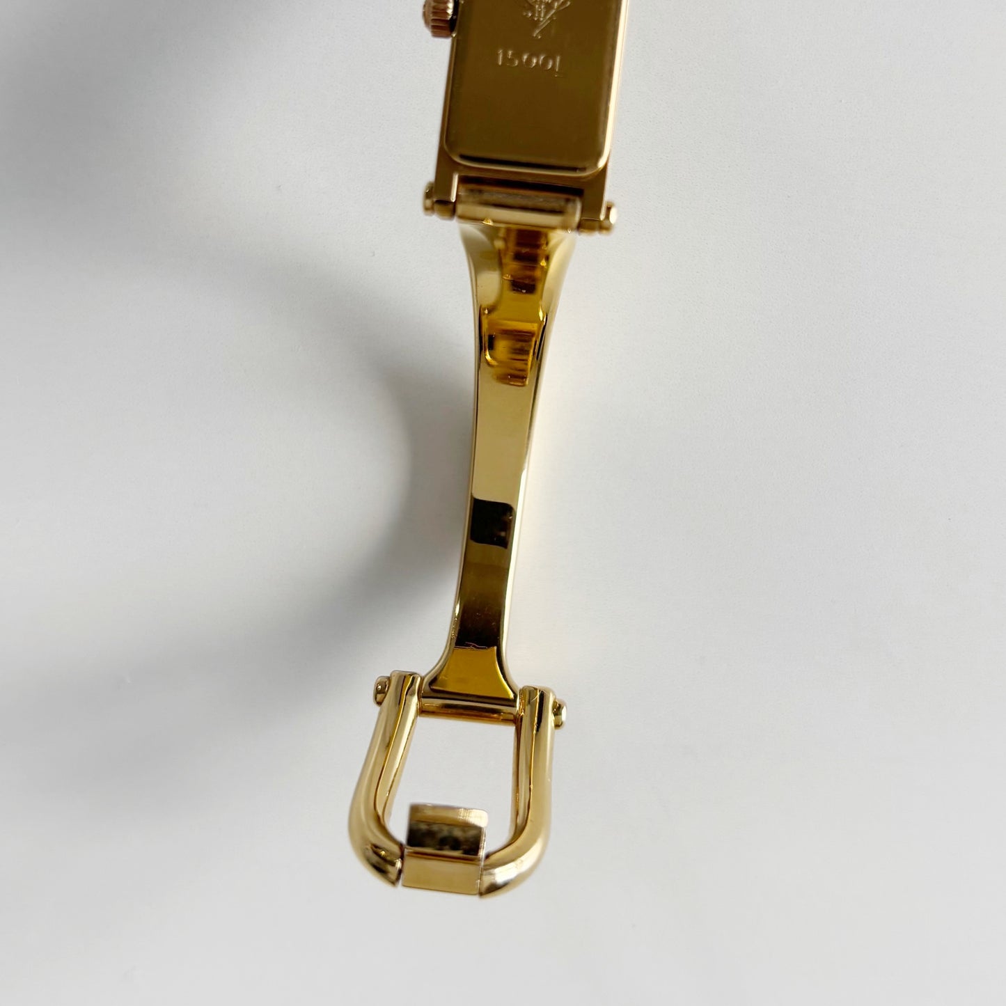 Gucci 1990s Gold Rectangular Dial Gold Plated Bangle Watch