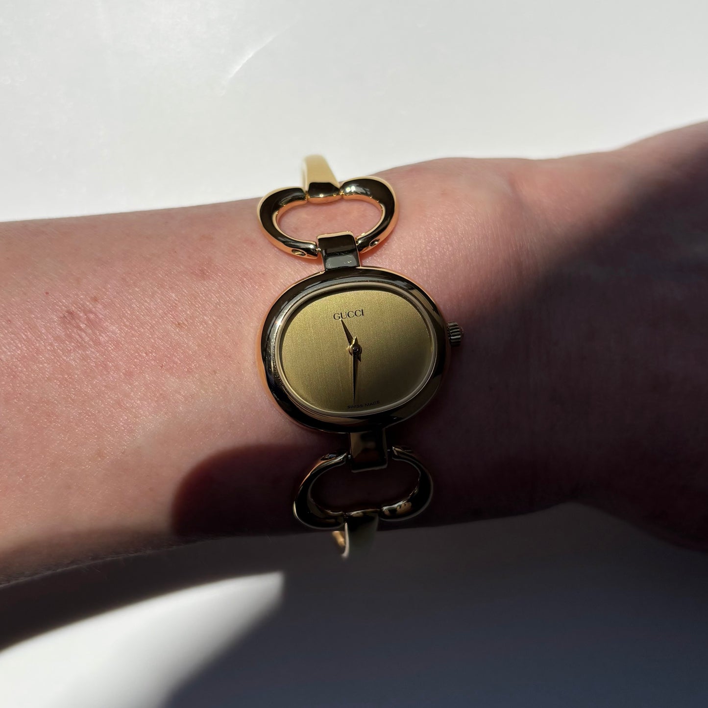 Gucci 1990s Oval Dial Gold Plated Bangle Watch