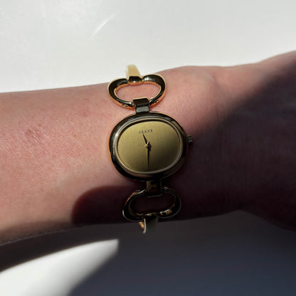 Gucci 1990s Oval Dial Gold Plated Bangle Watch