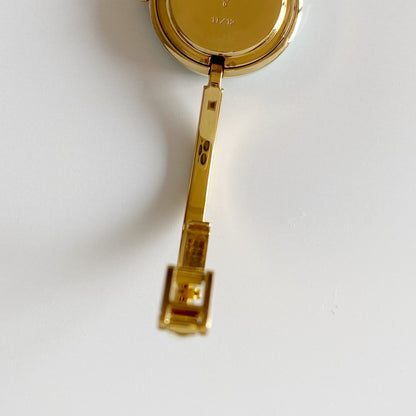 Gucci 1990s Interchangeable Bezel Gold Plated Bangle Watch with 12 bezels, case