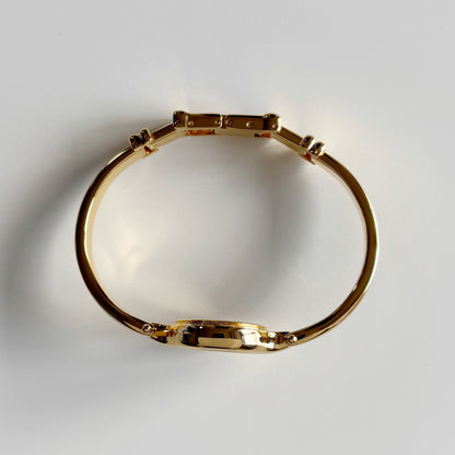 Burberry 1990s Round Dial Gold Plated Bangle Watch