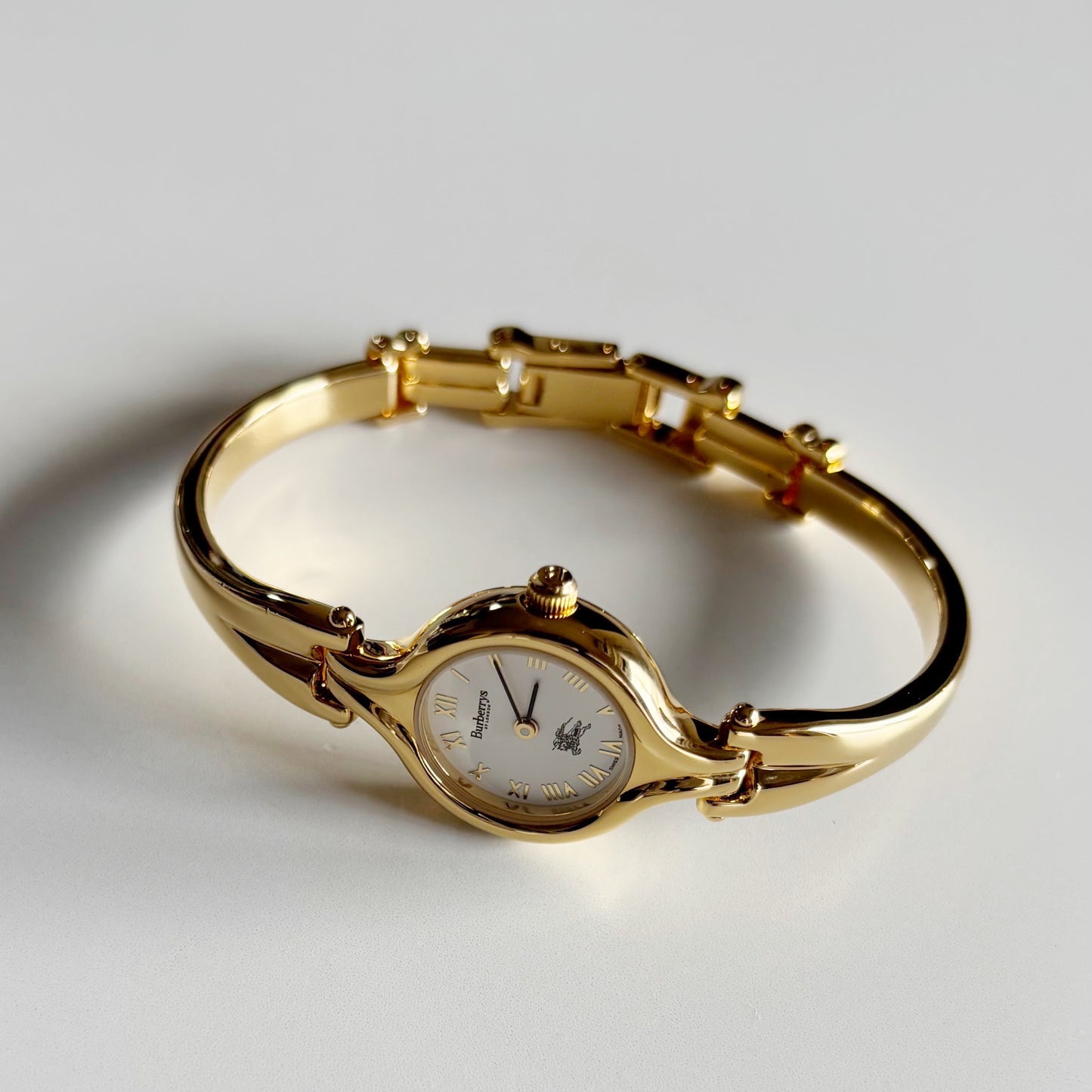 Burberry 1990s Round Dial Gold Plated Bangle Watch