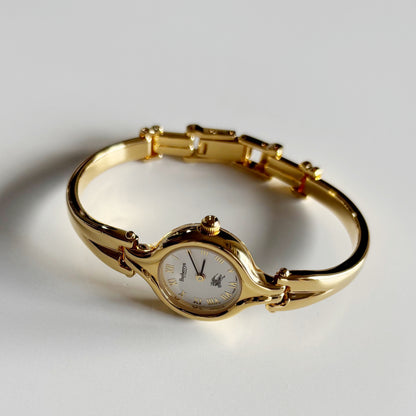 Burberry 1990s Round Dial Gold Plated Bangle Watch