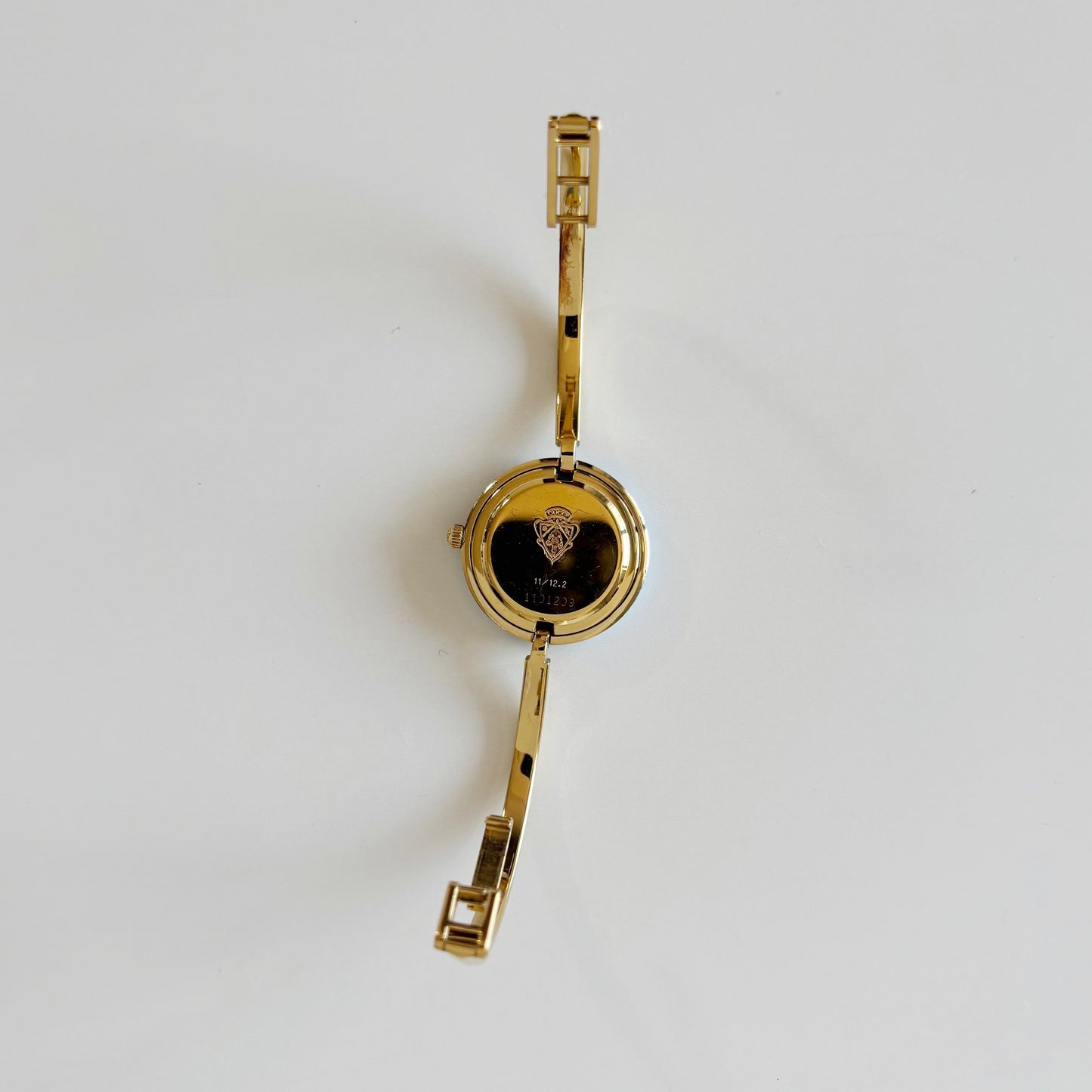 Gucci 1990s Interchangeable Bezel Gold Plated Bangle Watch with 12 bezels, case