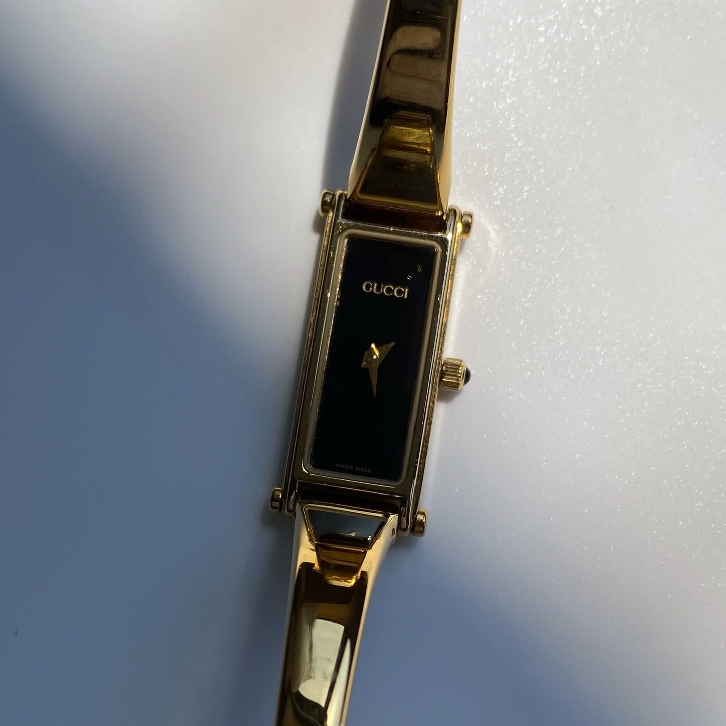 Gucci 1990s Rectangular Black Dial Gold Plated Bangle Watch