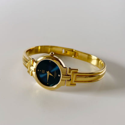 Givenchy 1990s Navy Round Dial Gold Plated Bangle Watch