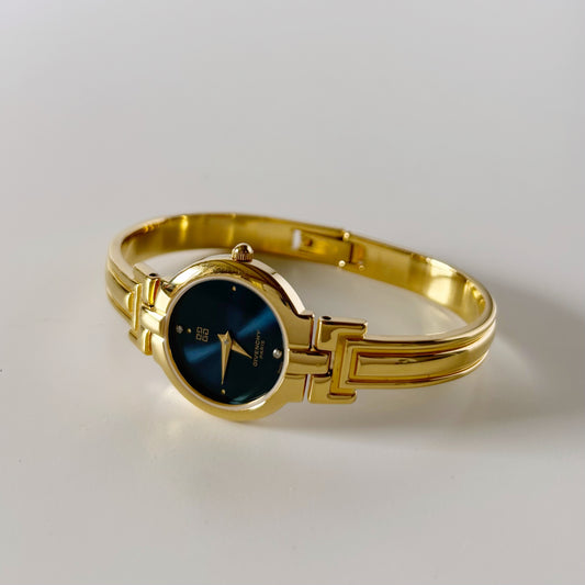 Givenchy 1990s Navy Round Dial Gold Plated Bangle Watch