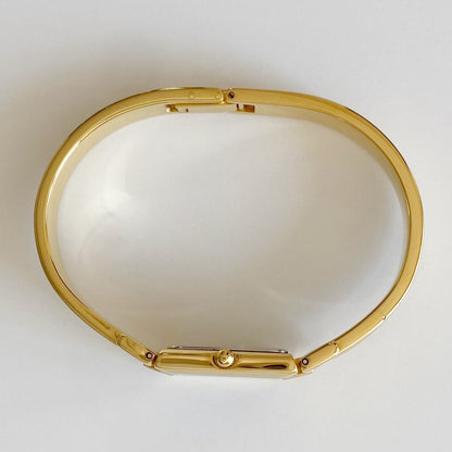 Givenchy 1990s Navy Dial Gold Plated Bangle Watch