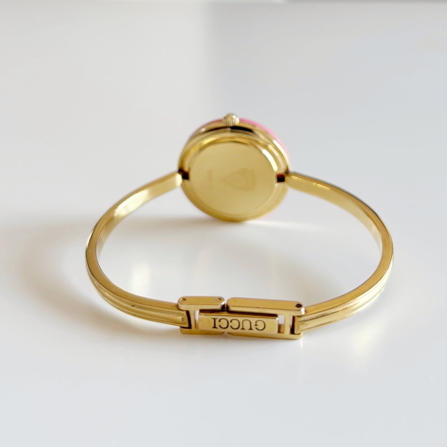 Gucci 1990s Interchangeable Bezel Gold Plated Bangle Watch with 12 bezels, case