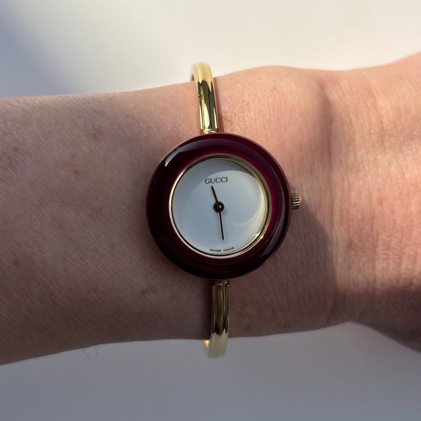 Gucci 1990s Interchangeable Bezel Gold Plated Bangle Watch with 12 bezels, case