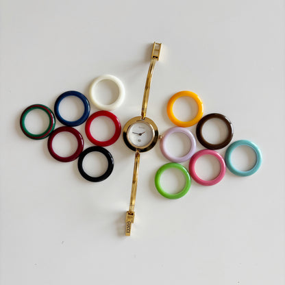 Gucci 1990s Interchangeable Bezel Gold Plated Bangle Watch with 12 bezels, case (Small)