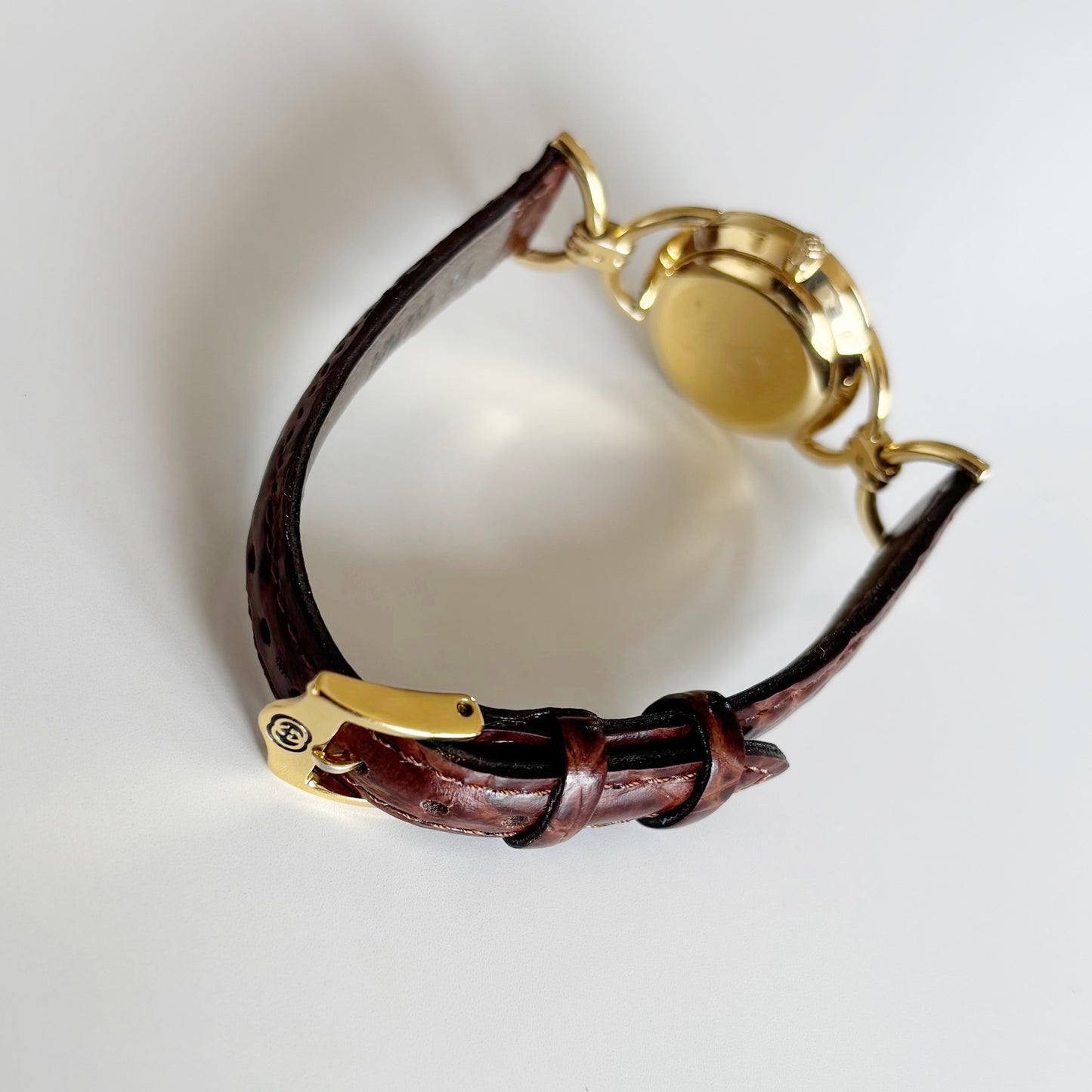 Gucci 1990s Round Dial Gold Plated Horsebit Watch