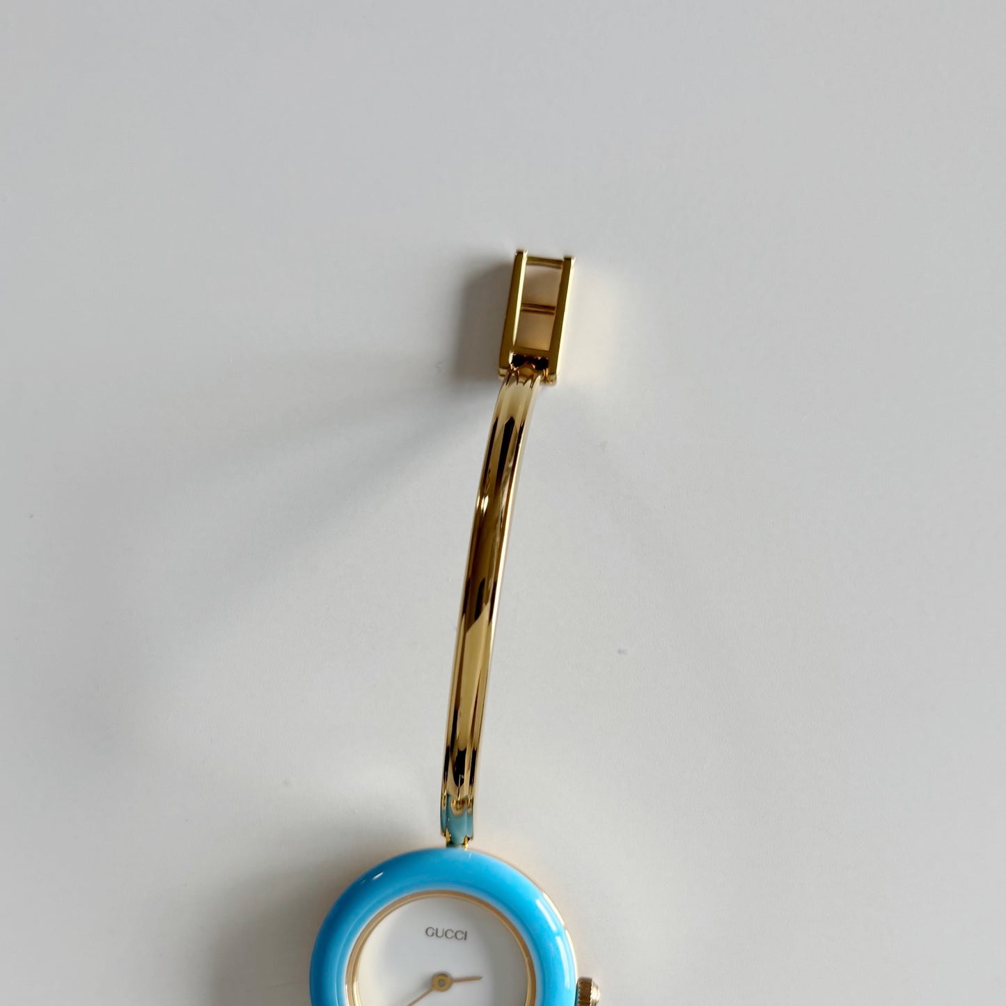 Gucci 1990s Interchangeable Bezel Gold Plated Bangle Watch with 12 bezels, case