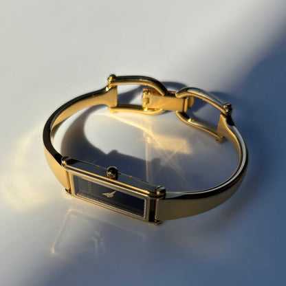 Gucci 1990s Black Dial Rectangular Gold Plated Bangle Watch