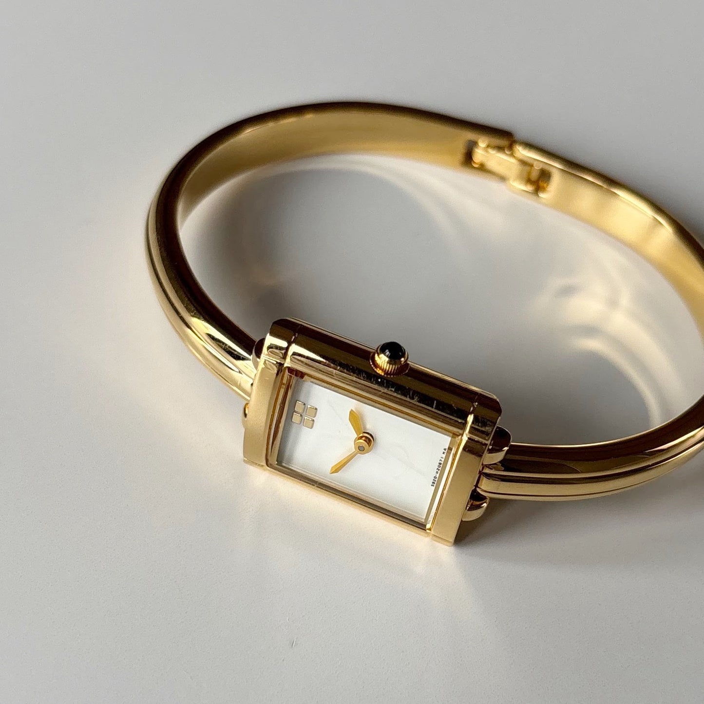 Yves Saint Laurent 1990s Seashell Dial Gold Plated Bangle Watch