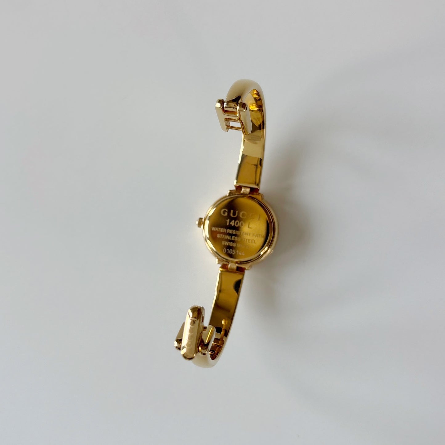 Gucci 1990s Round Dial Gold Plated Bangle Watch