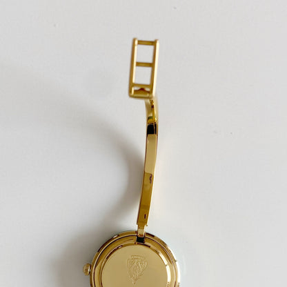 Gucci 1990s Interchangeable Bezel Gold Plated Bangle Watch with 12 bezels, case