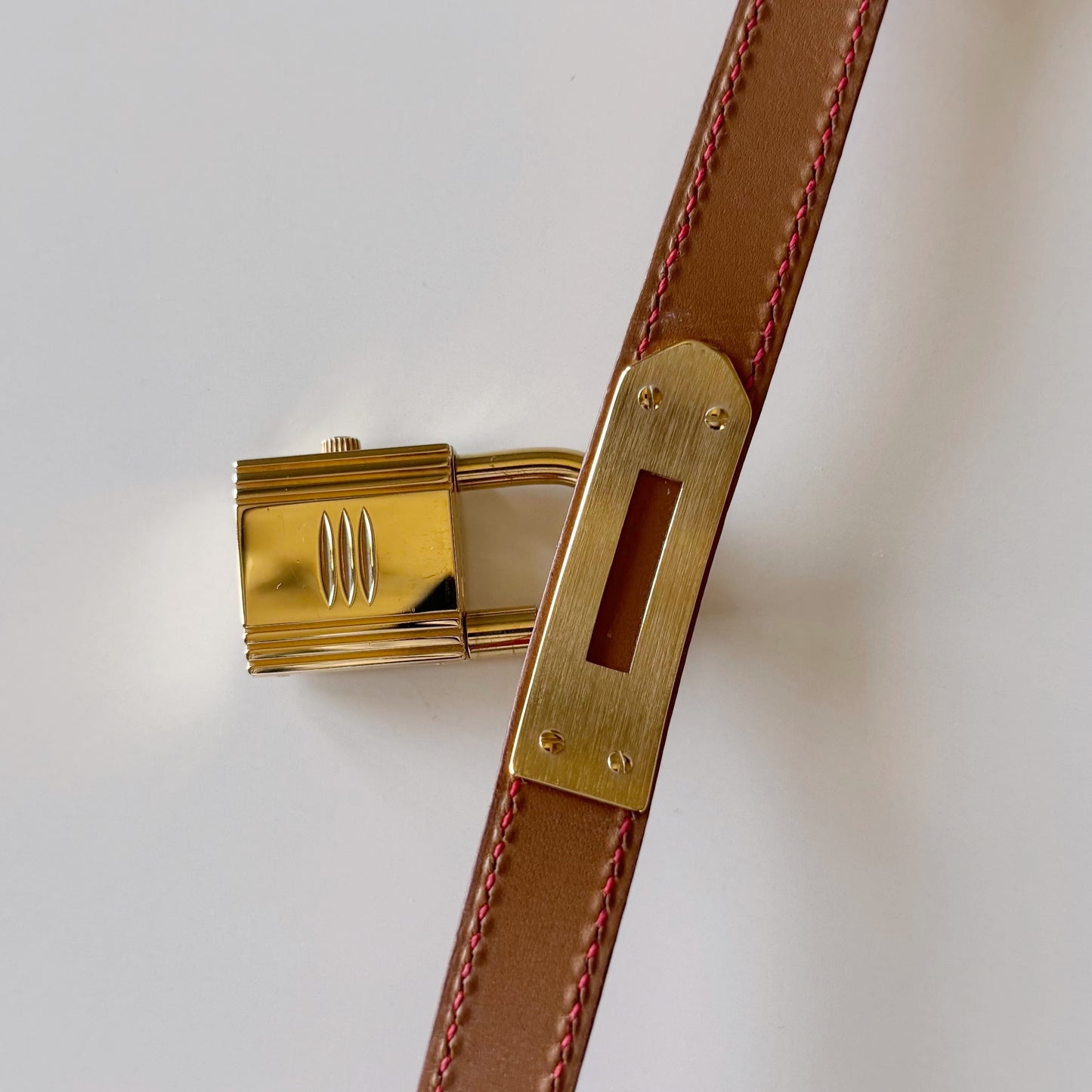 Hermes 1990s Kelly Red Dial Gold Plated Watch