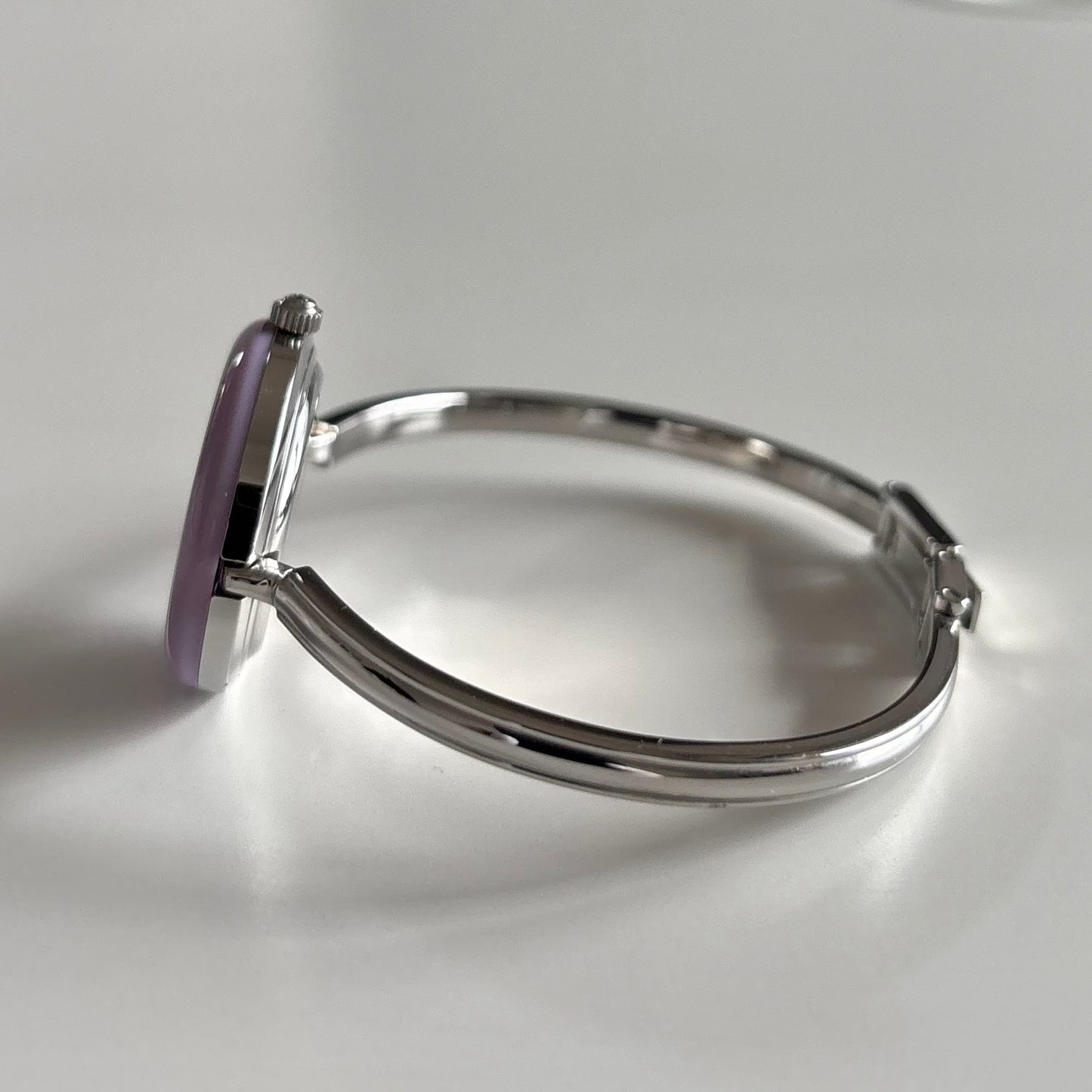 Gucci 1990s Interchangeable Bezel Stainless Steel Bangle Watch with 12 bezels, case
