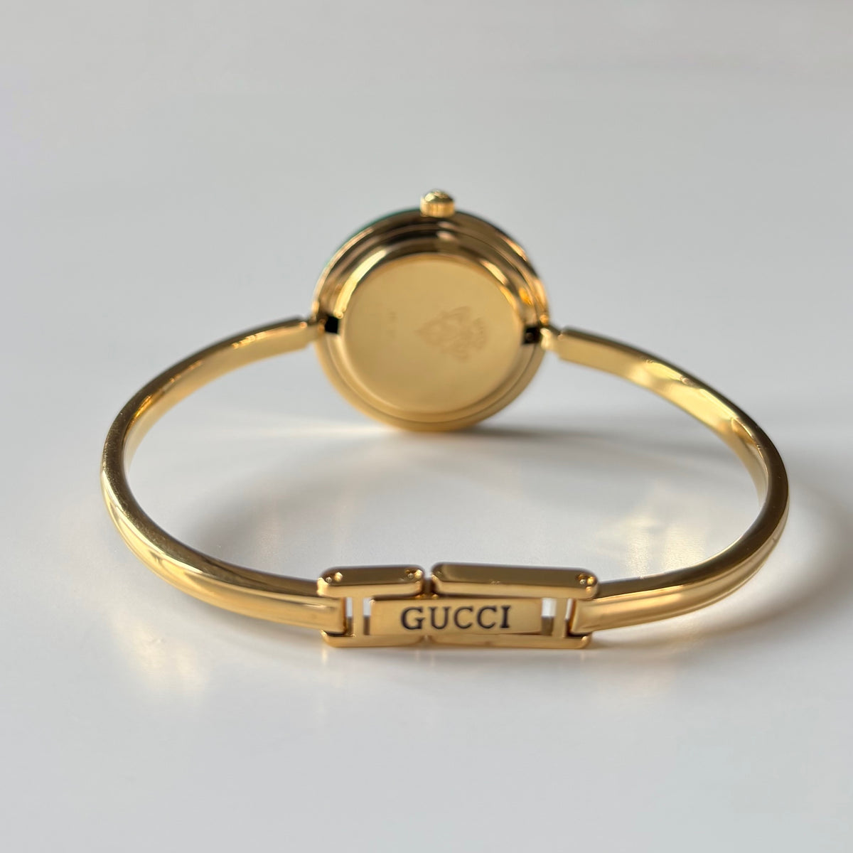 Gucci 1990s Interchangeable Bezel Gold Plated Bangle Watch with 12 bezels, case