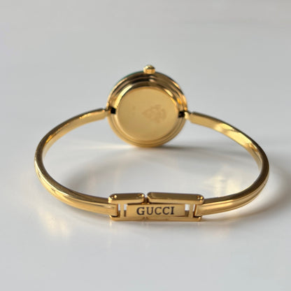 Gucci 1990s Interchangeable Bezel Gold Plated Bangle Watch with 12 bezels, case