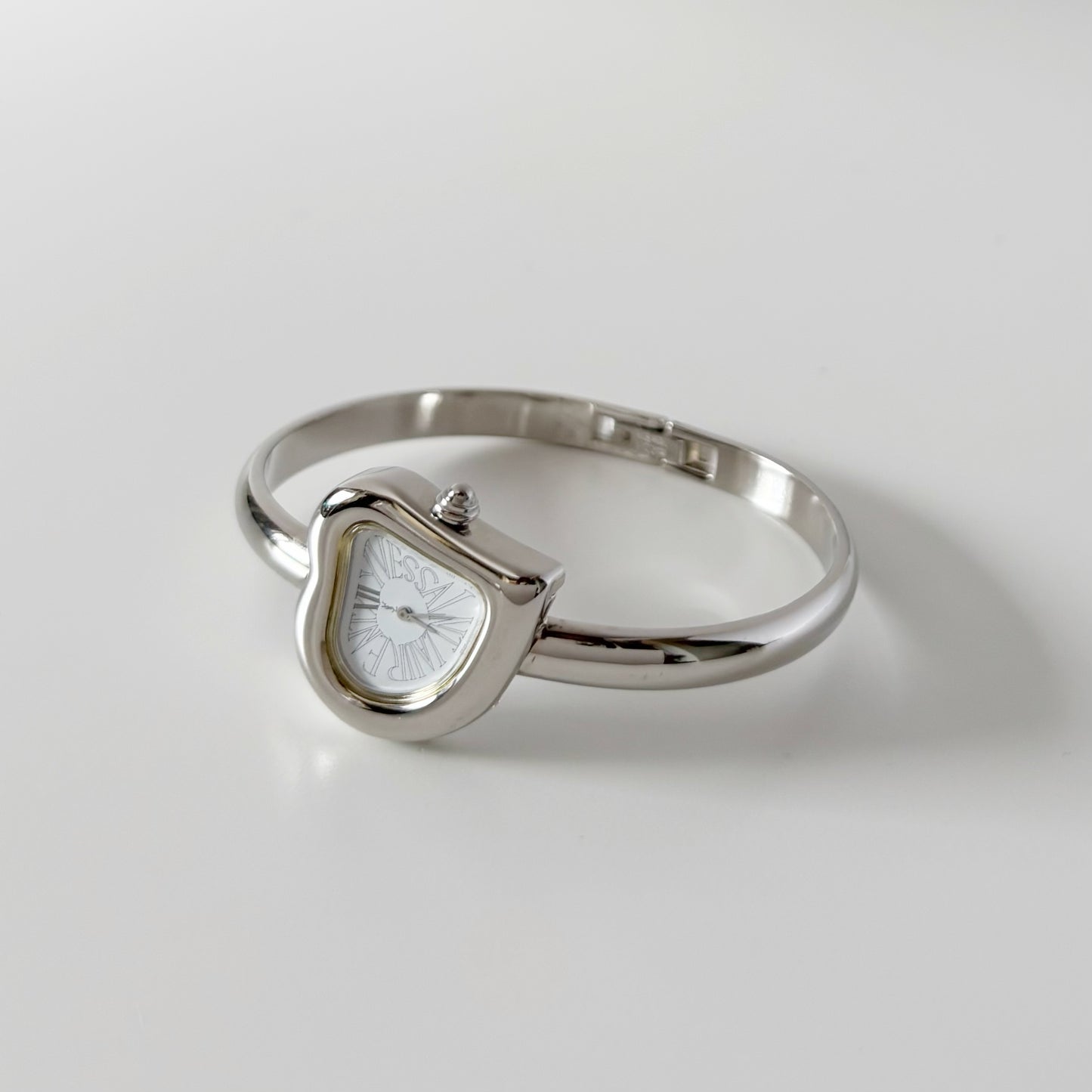 Yves Saint Laurent 1990s Heart Shaped Dial Silver Bangle Watch