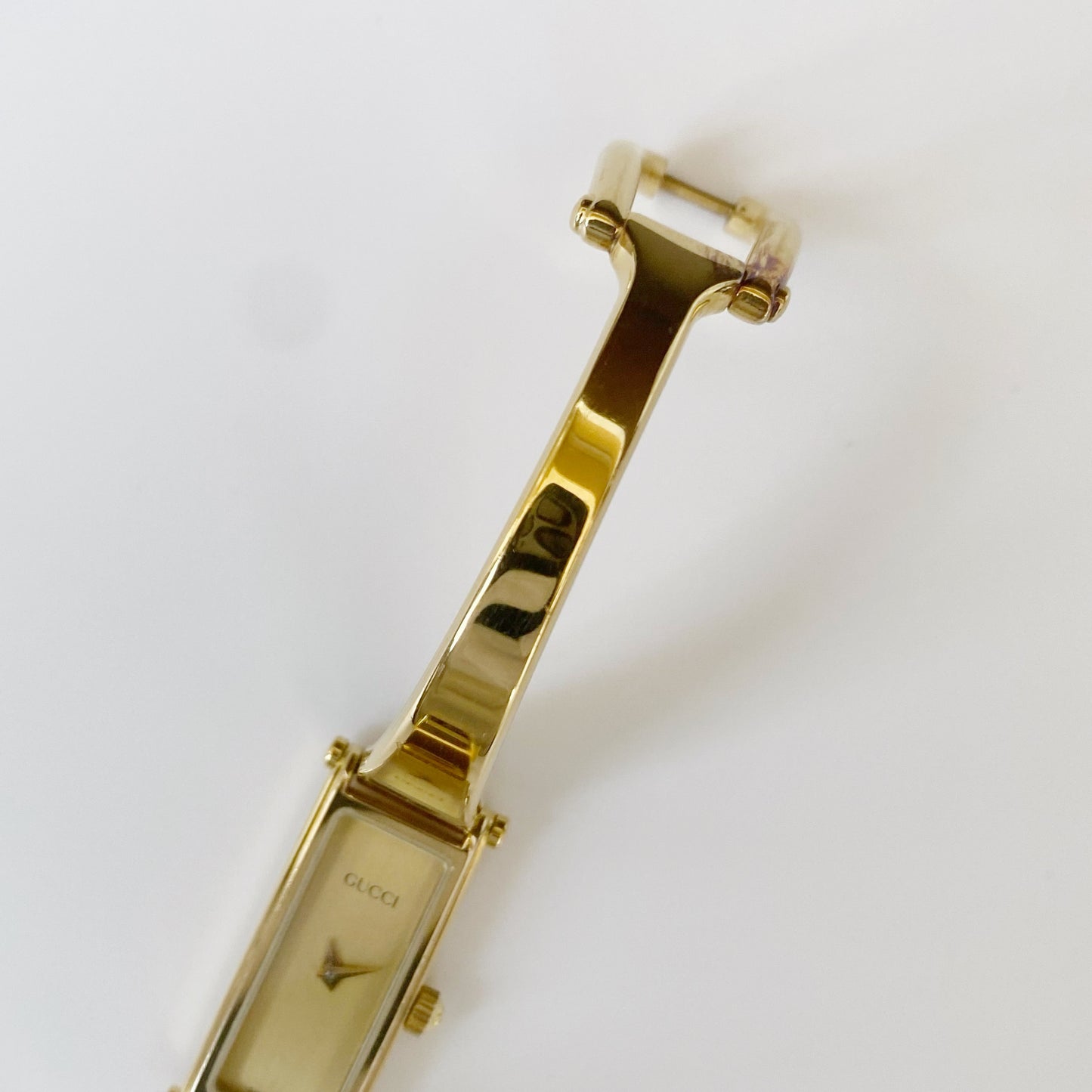 Gucci 1990s Rectangular Gold Plated Bangle Watch