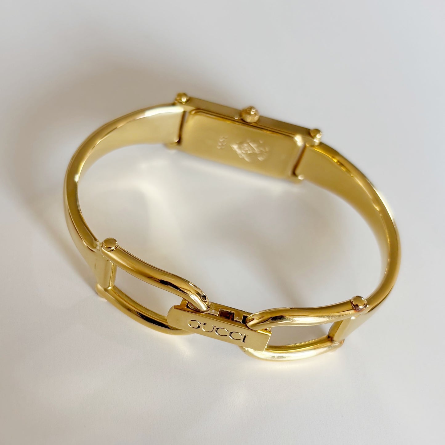 Gucci 1990s Gold Dial Rectangular Gold Plated Bangle Watch