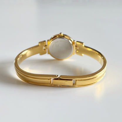 Givenchy 1990s Round Dial Gold Plated Bangle Watch