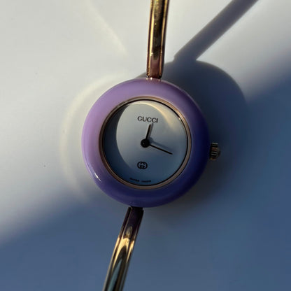 Gucci 1990s Interchangeable Bezel Gold Plated Bangle Watch with 12 bezels, case