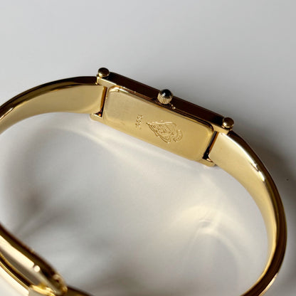 Gucci 1990s Seashell Rectangular Dial Gold Plated Bangle Watch