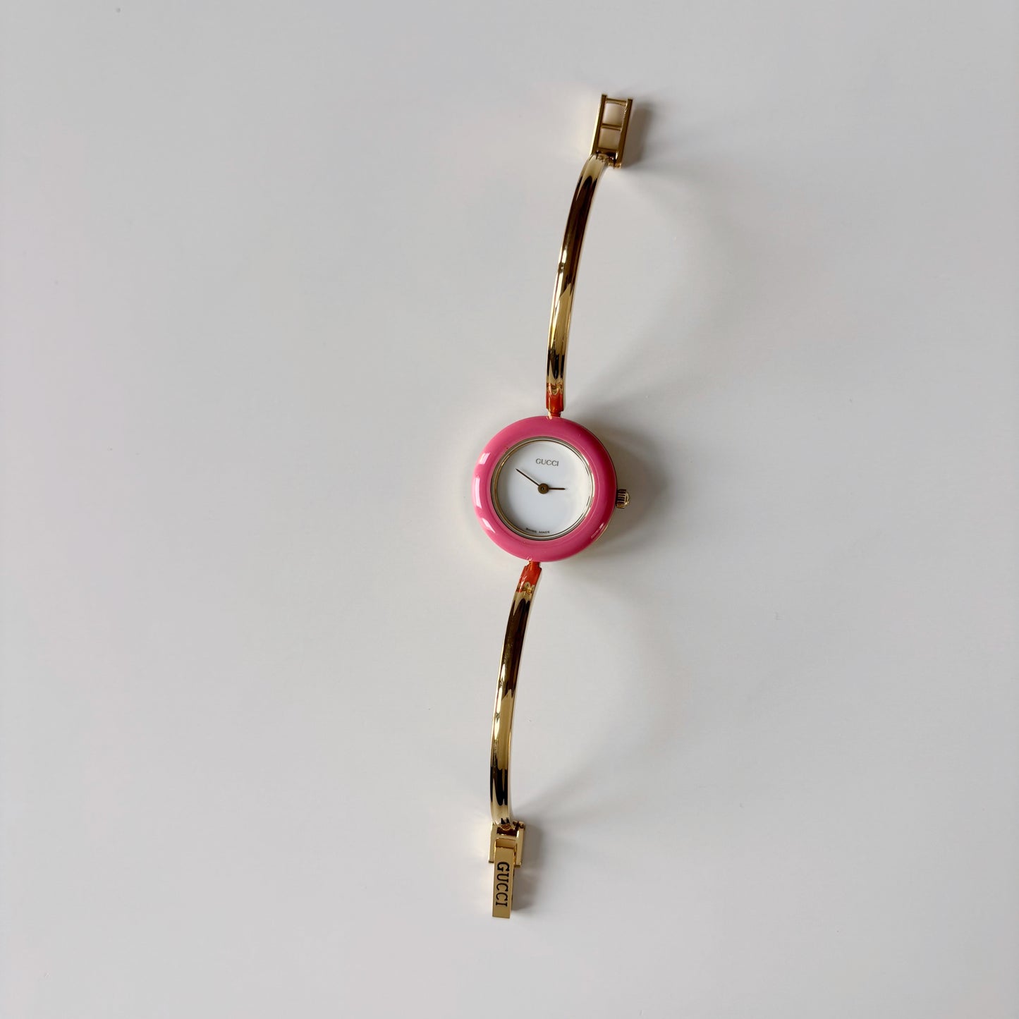 Gucci 1990s Interchangeable Bezel Gold Plated Bangle Watch with case, 12 bezels