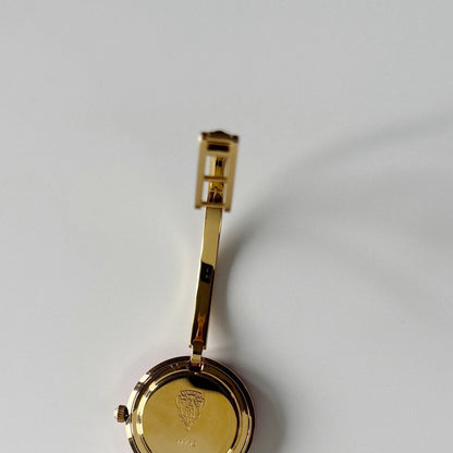 Gucci 1990s Interchangeable Bezel Gold Plated Bangle Watch with 12 bezels, case