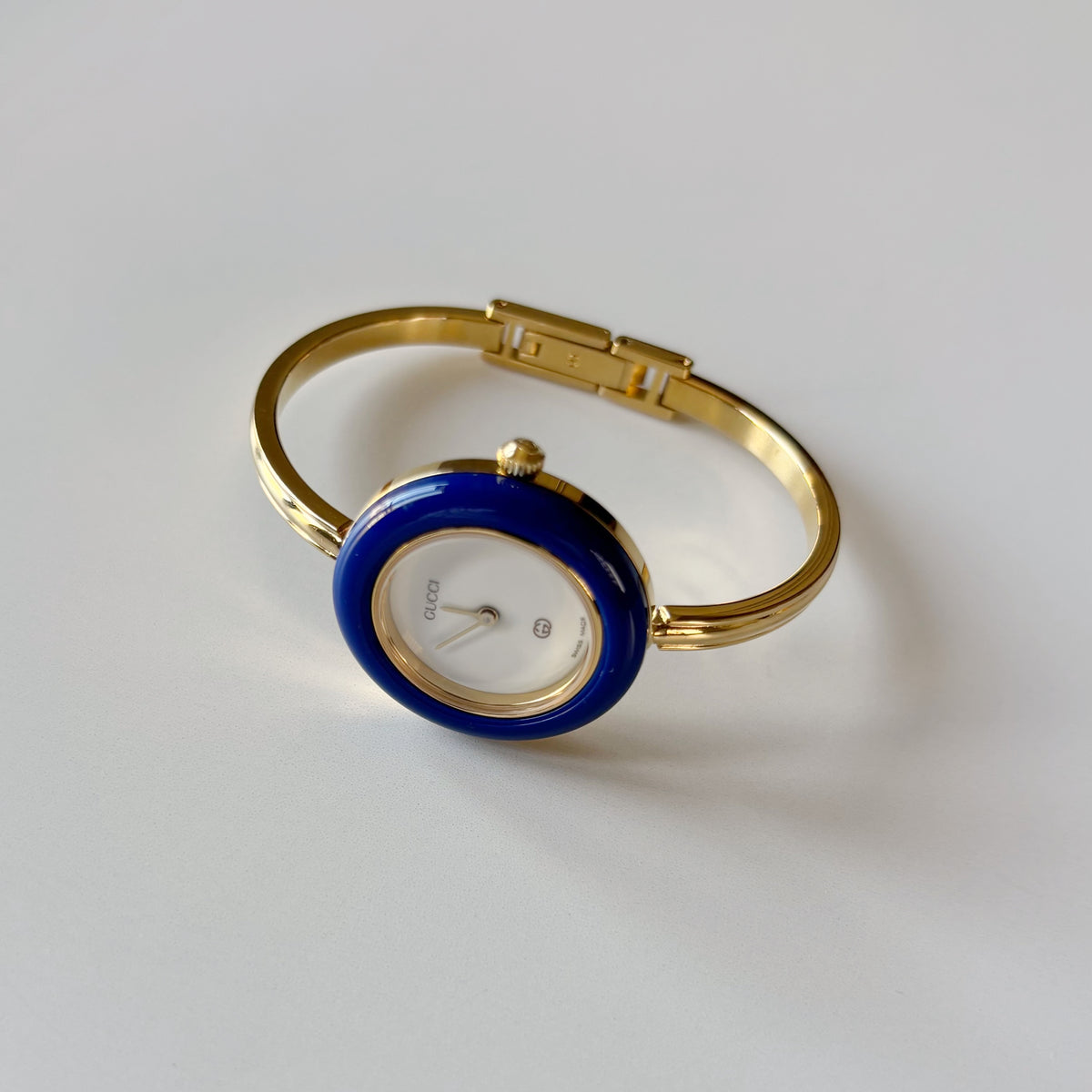Gucci 1990s Interchangeable Bezel Gold Plated Bangle Watch with 12 bezels, case (Small)