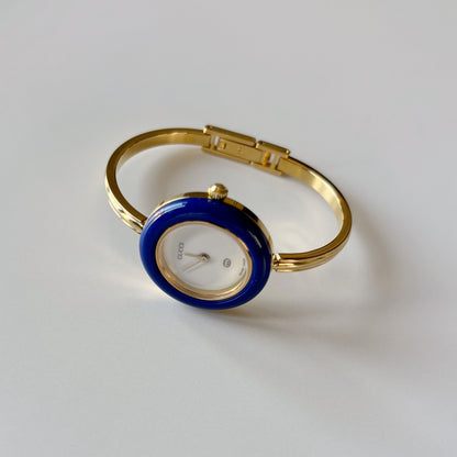 Gucci 1990s Interchangeable Bezel Gold Plated Bangle Watch with 12 bezels, case (Small)