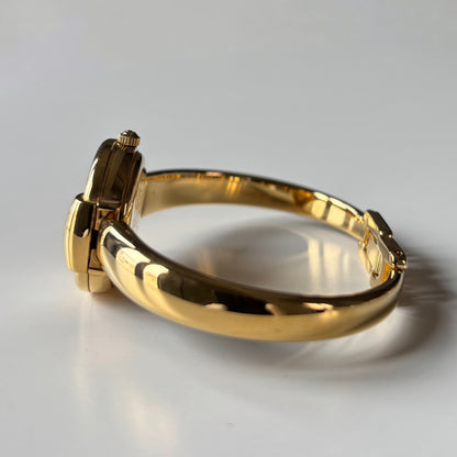 Gucci 1990s Round Dial Gold Plated Bangle Watch