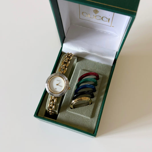 Gucci 1990s Interchangeable Bezel Gold Plated Watch with 6 bezels, box