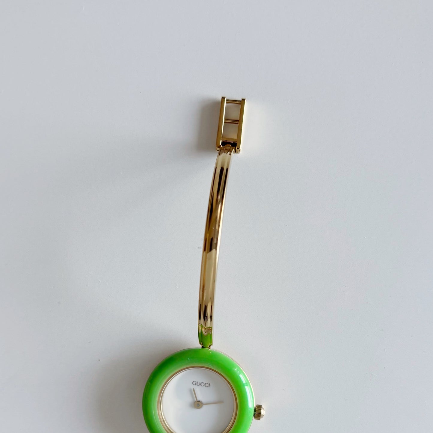 Gucci 1990s Interchangeable Bezel Gold Plated Bangle Watch with 12 bezels, case
