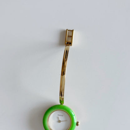 Gucci 1990s Interchangeable Bezel Gold Plated Bangle Watch with 12 bezels, case